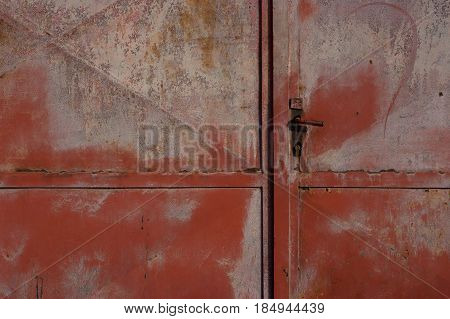 Detailed view of an old metal fence, which succumbed to corrosion.