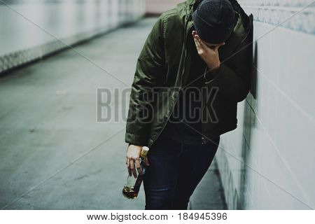 Homeless Alcoholism Man Holding Liquor Bottle Feeling Depressed