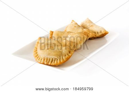 Typical Spanish empanadas isolated on white background