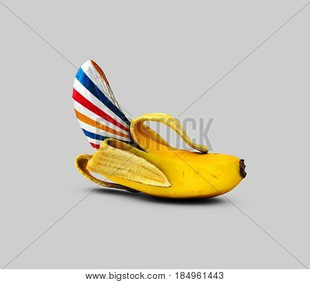 Realistic 3d illustration of caramel banana isolated on gray background.