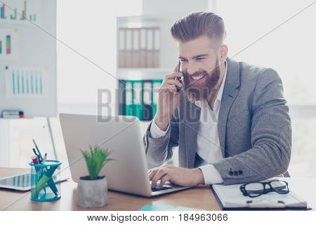 Cheerful Businessman Is Smiling Talking To Businesspartner About Success Of The Company. Income Incr