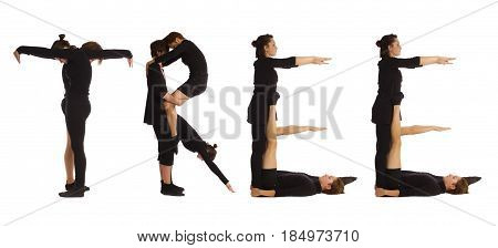 Black dressed people forming word TREE on white background