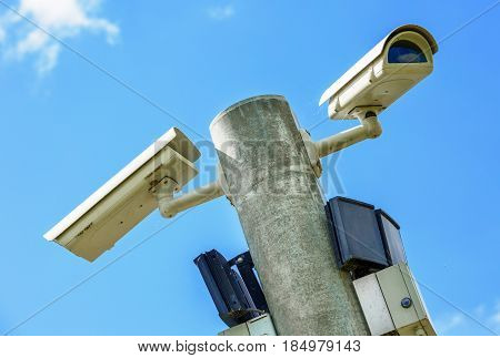 Cctv Security Camera And Urban Video. Closeup View.