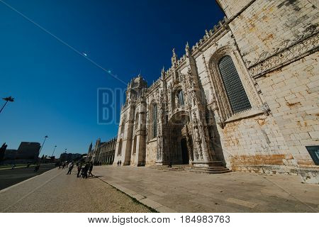LISBON,PORTUGAL-FEBRUARY 2017: Entrance to the church and cloister of Mosteiro dos Jerónimos,Belém,Lisbon.The Jeronimos Monastery is National Pantheon and one of the important attractions of Portugal