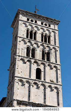 Bell tower of the church of San Michele in Foro in Pisan-romanesque style in the ancient town of Lucca Toscana (Tuscany) Italy Europe
