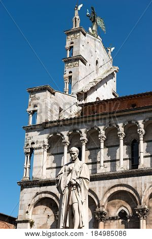 Detail of the church of San Michele in Foro and the statue of Francesco Burlamacchi in the ancient town of Lucca Toscana (Tuscany) Italy Europe
