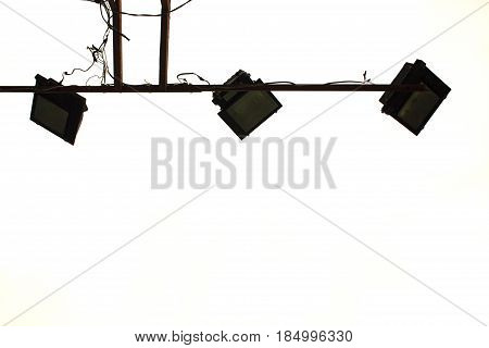 Tennis court flood light on white background. Modern light for playground. Sport stadium lighting. Flood light lamps isolated. Electrical supply for outside playing. Tennis court equipment. Floodlight