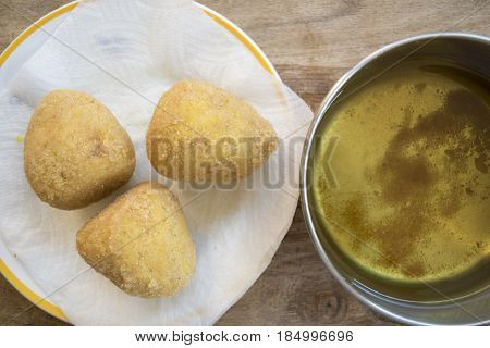 sicilian arancini with the casserole with the fried oil used to fry It