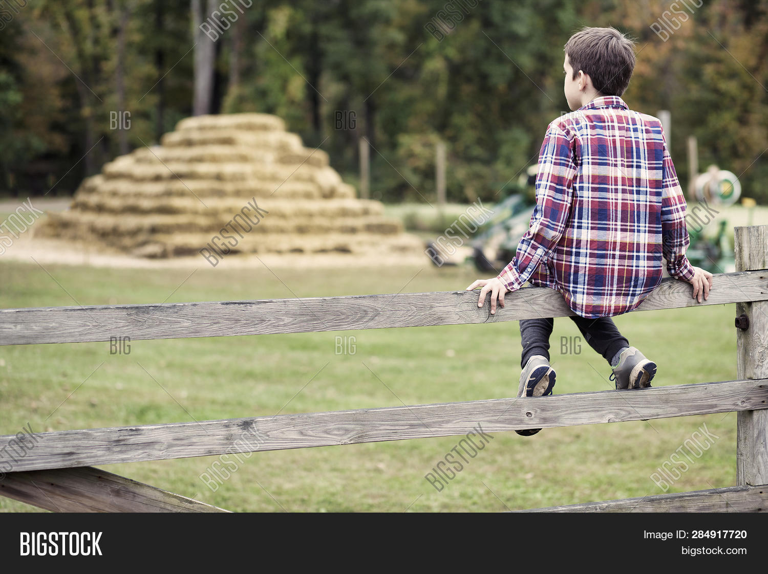 Boy Sitting On Fence. Image & Photo (Free Trial) Bigstock