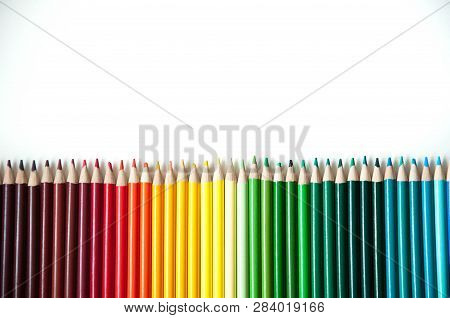 Many Multi-colored Pencils.
Background With Color Pencils. Rainbow Colors, Palette. Bright And Color