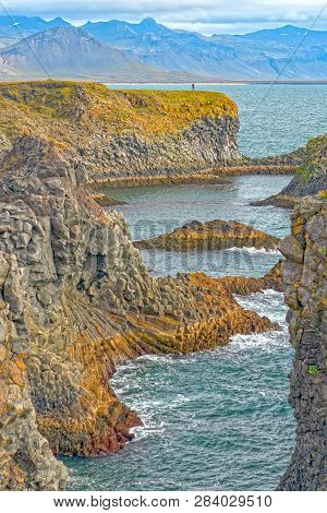 Dramatic Lava Formations On A Remote Coast Near Arnarstapi, Iceland