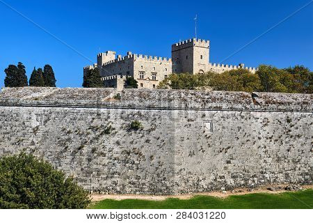 The Moat And Turrets Of The Medieval Castle Of The Joannite Order In The City Of Rhodes