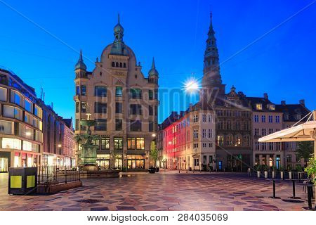 Stork Fountain On The Amagertorv Square, Stroget Street During Morning Blue Hour, Copenhagen, Capita