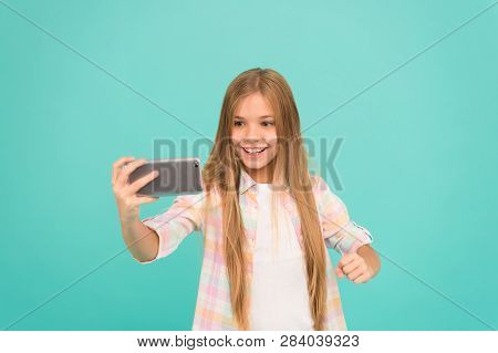 Video Call Concept. Girl Hold Smartphone Taking Selfie. Selfie For Social Networks. Streaming Online