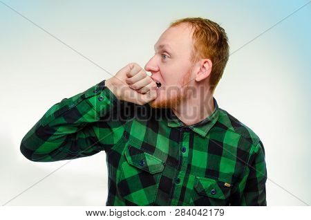 Red Haired Man Bite His Fist, Hand. Shocked, Caucasian Male Teenager. Surprised Redhead Guy Scream. 