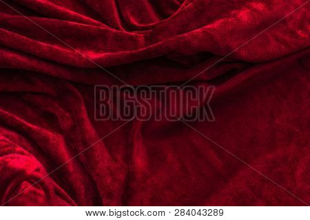 Dark Red Matte Background Of Suede Fabric, Closeup. Velvet Texture Of Seamless Wine Leather. Felt Ma