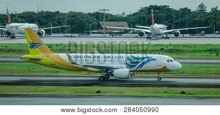 Passenger Airplane At Manila Airport, Philippines