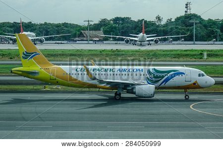 Passenger Airplane At Manila Airport, Philippines