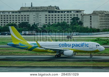 Passenger Airplane At Manila Airport, Philippines