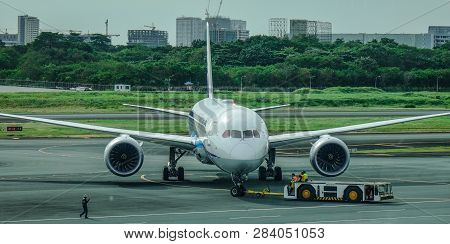Passenger Airplane At Manila Airport, Philippines