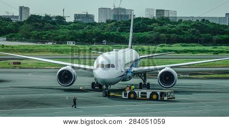 Passenger Airplane At Manila Airport, Philippines
