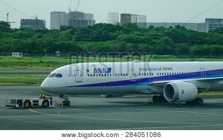 Passenger Airplane At Manila Airport, Philippines