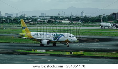 Passenger Airplane At Manila Airport, Philippines