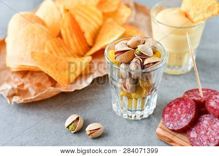 Aperitif Snacks At The Bar.relax In The Bar With Friends, Beer Party.  Selective Focus And Copy Spac