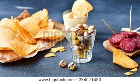 Aperitif Snacks At The Bar.relax In The Bar With Friends, Beer Party.  Selective Focus And Copy Spac