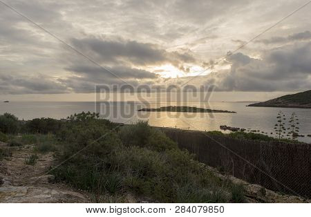 The Cala Sa Sal Rossa In Ibiza At Dawn
