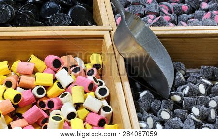 Many Pieces Of Licorice Candy In The Candy Store