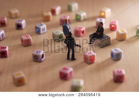 Top View Three Mini Figure Businessman Toy Talking Each Other