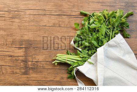 Zero Waste Use Less Plastic Concept / Fresh Vegetables Organic In Eco Cotton Fabric Bags On Wooden T