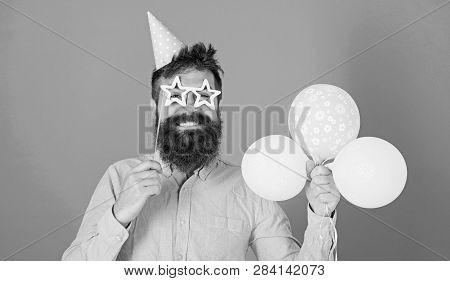Balloon Artist At Birthday Party. Bearded Man Entertaining Kids At International Children Day Celebr