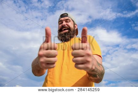 Good Luck. Man Bearded Muscular Brutal Hipster Outdoors Sky Background. Masculinity And Brutality. L