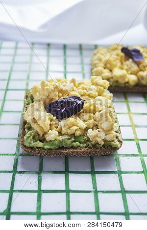 Sandwich With Scrumble Egg And An Avocado