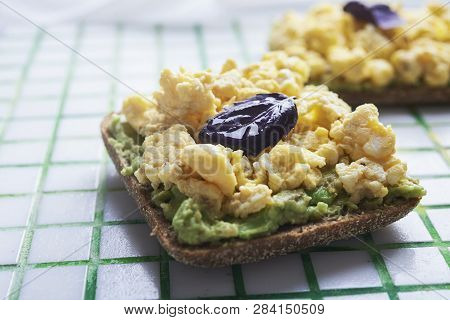 Sandwich With Scrumble Egg And An Avocado