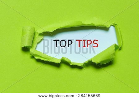 Ufo Green Torn Paper Written With Top Tips.