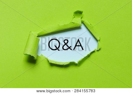 Ufo Green Torn Paper Written With Q&a. Questions And Answers.