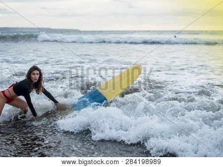 Young Girl In Bikini - Surfer With Surf Board Dive Underwater With Fun Under Big Ocean Wave. Family 