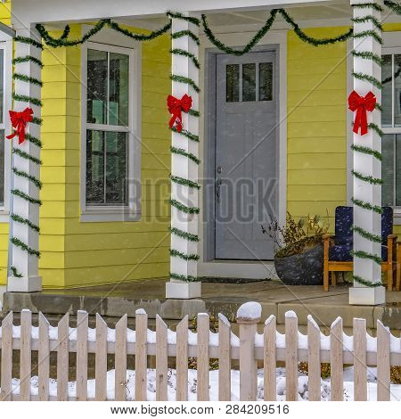 Entrance To A Home With Christmas Decorations