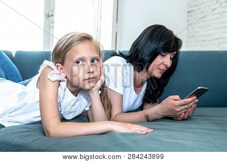 Internet Addicted Mum Using Her Smart Phone Ignoring Her Sad Lonely Child