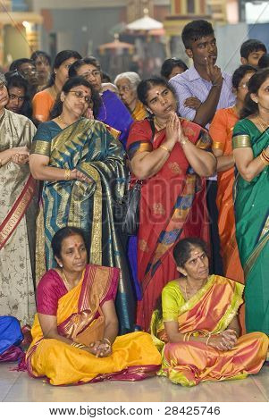 Hindu Devotees Gather And Pray During The Chariot Festival At Richmomd Hill Temple
