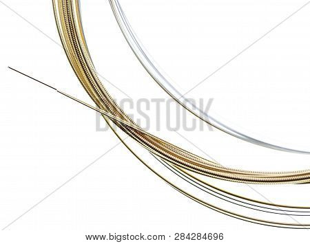 Strings For Guitar Isolated On A White Background. Macro