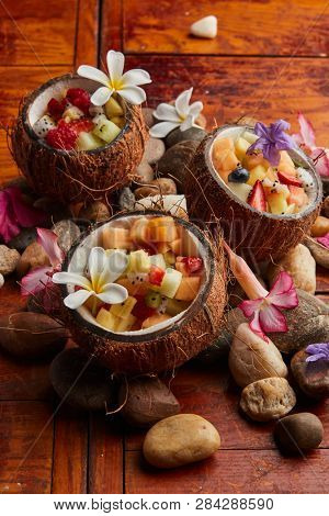 Hawaian fruit salad, coconut with fruitsalad