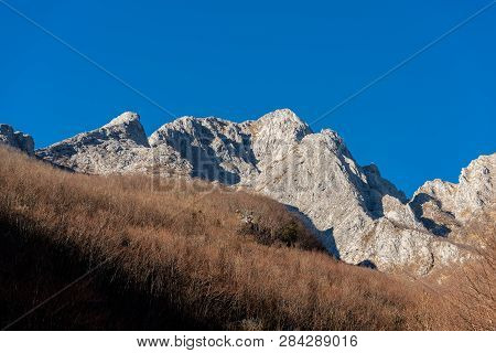 Peak In Apuan Alps (alpi Apuane) In Winter With Rock And Bare Trees. Garfagnana, Tuscany, Italy, Eur