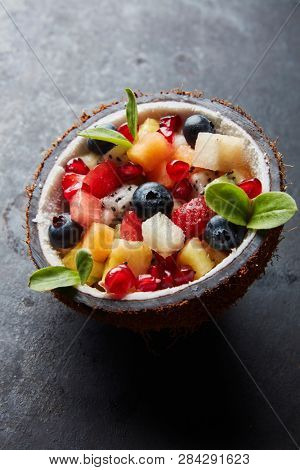 Hawaian fruit salad, coconut with fruitsalad