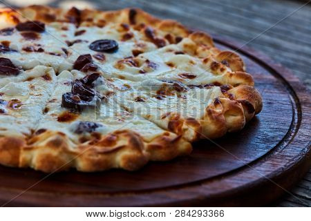 Lebanese style flatbread with cheese and olives