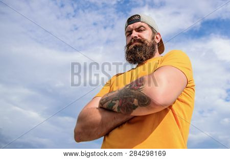 Masculinity And Brutality. Lumbersexual Tattooed Well Groomed Hipster. Hipster With Mustache And Lon