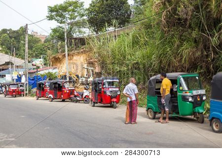 Ella, Sri Lanka - August 3, 2018: People And Tuk Tuks On The Main Road. Ella Is A Mountain Town In T